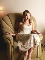 Gorgeous blonde with shaved pussy spreading her legs