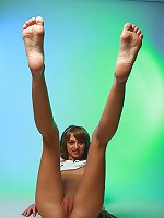 Fresh and young blonde teen spreads her legs and touches clitoris