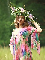 Beautiful small breasted teen posing nude on the meadow