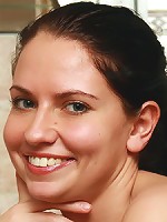 Naturally hairy brunette showing her pussy