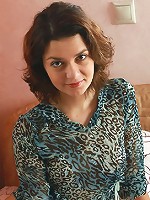 Petite curly brunette teen with perfectly shaved pussy