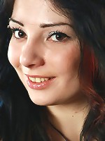 Brunette petite babe with pierced nipples and tatoos