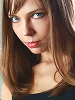 Skinny redhead showing her tits and shaved pussy