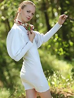 Glorious and dazzling angel in pink panties likes to show her kitty on the nature