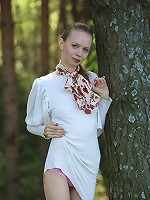 Glorious and dazzling angel in pink panties likes to show her kitty on the nature