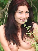 Horny and daring brunette Selma with huge tattoo on her back is having fun outdoors