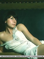 Nubile, fresh, and innocent, Lana shares a generous serving of her erotic assets, starting with her round, delectable breasts, and untrimmed bush.