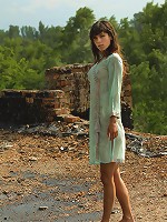 Carefree cutie with slender body, bathing under the rain.