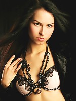 Sultry babe with lustrious black hair and hypnotic eyes.