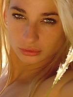 Relaxed blonde with natural charms.