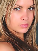 Melisa puts a dazzling performance, posing and evoking seductive yet elegant like that of a budoir doll, her gorgeous body garbed in sheer stockings and matching garter belt.