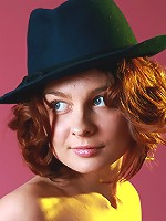 Redhead teen with hairy pussy stripping and spreading legs