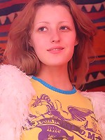 Young rehread exposes her pussy