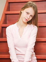 Teen dildoing herself on the stairs