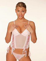 Horny young chick poses naked on floor