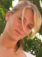 Horny young chick masturbates pussy outdoors