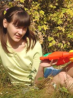 Russian teen Juliya strips in a field