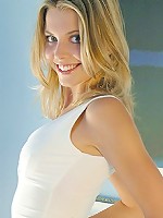 Blonde hottie is a sexy white dress