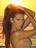 Hot Nubile shows off her tits