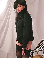 Stunning brunette Romina plays with a thick dildo