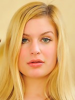 Danielle plays with her shoe