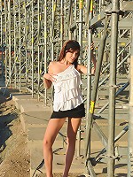 Nubiles.net Nicol - Lustful babe Nicol looks great on those steel bars outside while she pleasures her exposed pussy