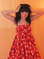 Kaira stripping in sexy black stockings and lace panties