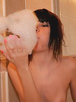 Petite 18yo teen relaxing & playing in hot bath