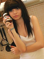 Kaira smears melting chocolate all over her petite naked body