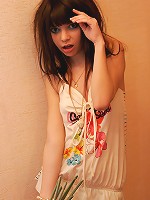 Petite brunette teen Kaira plays in her cute skimpy dress