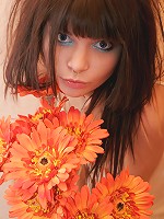 Petite brunette teen Kaira plays in her cute skimpy dress