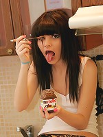 Kaira smears melting chocolate all over her petite naked body