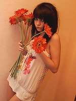 Petite brunette teen Kaira plays in her cute skimpy dress