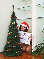 Smoking hot teen girl waits for you under Cristmas tree