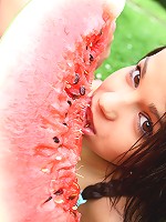 Barely legal teen Kiki touching herself in the garden