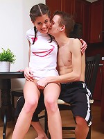 Skinny teen riding absolutely massive dick