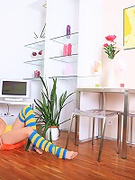 Caprice smears some cream over her shaved pink pussy