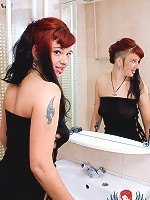 Cry-babe Marixa puts very brith fetish make-up on her face & strips