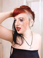 Cry-babe Marixa puts very brith fetish make-up on her face & strips