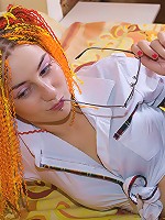 Fetish photos of red dreadlocked teen in schoolgirl uniform