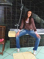 This gorgeous brunette teen loves to take a bath but more than that she loves stripping off to take a bath because as she watches her tight body in the mirror she lets her fingers tease her warm wet pussy!