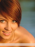 Zemani.com Katrin - Magic red angel Katrin with hairy fine pussy poses nude on the beach.